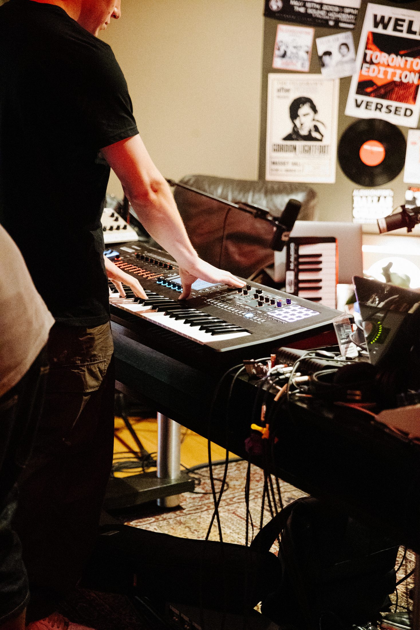Producer mixing tracks at the console